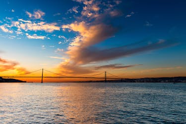 Sunset cruise on the Tagus River with a glass of wine